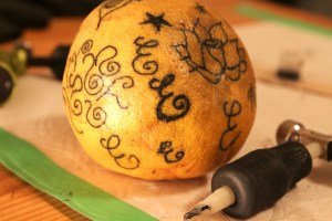 My first tattoo practice on a grapefruit. All freehand with a liner.